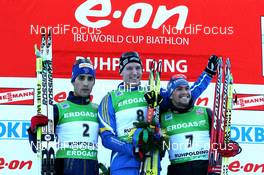 16.01.2011, Ruhpolding, Germany (GER): (L-R) Martin Fourcade (FRA), Rossignol, Rottefella, OneWay, Odlo, Bjoern Ferry (SWE), Fischer, Rottefella, Leki, adidas, Michael Greis (GER), Madshus, Rottefella, OneWay, adidas - IBU world cup biathlon, pursuit men, Ruhpolding (GER). www.nordicfocus.com. © Manzoni/NordicFocus. Every downloaded picture is fee-liable.