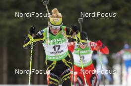 23.01.2011, Antholz, Italy (ITA): Marie Dorin (FRA), Rossignol, Rottefella, OneWay - IBU world cup biathlon, mass women, Antholz (ITA). www.nordicfocus.com. © Manzoni/NordicFocus. Every downloaded picture is fee-liable.