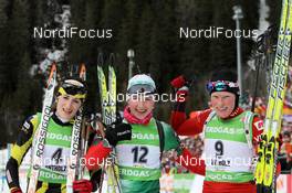23.01.2011, Antholz, Italy (ITA): (L-R): Marie Laure Brunet (FRA), Rossignol, Rottefella, Swix, Darya Domracheva (BLR), Fischer, Rottefella, Swix, Tora Berger (NOR), Fischer, Rottefella, Odlo - IBU world cup biathlon, mass women, Antholz (ITA). www.nordicfocus.com. © Manzoni/NordicFocus. Every downloaded picture is fee-liable.