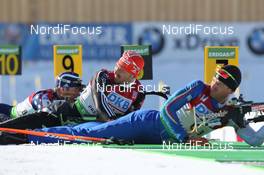 05.02.2011, Presque Isle, United States of America (USA): Alexander Wolf (GER), Fischer, Rottefella, Alpina, Leki adidas, Toko, Rene Laurent Vuillermoz (ITA), Rossignol, Rottefella, Exel - IBU world cup biathlon, relay mixed, Presque Isle (USA). www.nordicfocus.com. © Manzoni/NordicFocus. Every downloaded picture is fee-liable.