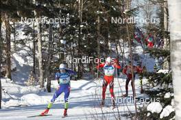 13.02.2011, Fort Kent, United States of America (USA): Jakov Fak (SLO), Fischer, Rottefella, Alpina, Swix leads Emil Hegle Svendsen (NOR), Madshus, Rottefella, Swix, Odlo - IBU world cup biathlon, mass men, Fort Kent (USA). www.nordicfocus.com. © Manzoni/NordicFocus. Every downloaded picture is fee-liable.