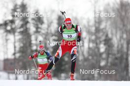 12.02.2011, Fort Kent, United States of America (USA): Julian Eberhard (AUT), Atomic  - IBU world cup biathlon, pursuit men, Fort Kent (USA). www.nordicfocus.com. © Manzoni/NordicFocus. Every downloaded picture is fee-liable.