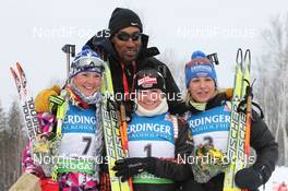 12.02.2011, Fort Kent, United States of America (USA): (l-r). Marie Dorin (FRA), Rossignol, Rottefella, OneWay, Scottie Pippen (USA), Basketball Hall of Famer, Andrea Henkel (GER), Fischer, Rottefella, Exel, adidas, Toko, Magdalena Neuner (GER), Fischer, Rottefella, Exel, adidas - IBU world cup biathlon, pursuit women, Fort Kent (USA). www.nordicfocus.com. © Manzoni/NordicFocus. Every downloaded picture is fee-liable.