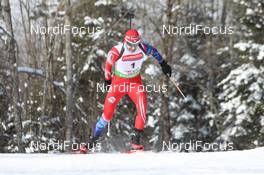 10.02.2011, Fort Kent, United States of America (USA): Tomas Holubec (CZE), Atomic, Rottefella, Alpina, Exel - IBU world cup biathlon, sprint men, Fort Kent (USA). www.nordicfocus.com. © Manzoni/NordicFocus. Every downloaded picture is fee-liable.