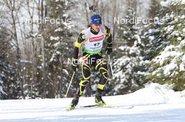 10.02.2011, Fort Kent, United States of America (USA): Vincent Jay (FRA), Fischer, Rottefella, OneWay - IBU world cup biathlon, sprint men, Fort Kent (USA). www.nordicfocus.com. © Manzoni/NordicFocus. Every downloaded picture is fee-liable.
