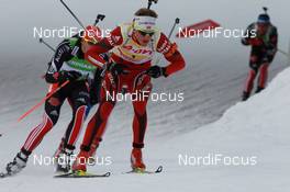 20.03.2011, Holmenkollen, Norway (NOR): Tarjei Boe (NOR), Fischer, Rottefella, Swix, ODLO, Arnd Peiffer (GER), Fischer, Salomon, Swix, adidas - IBU world cup biathlon, mass men, Holmenkollen (NOR). www.nordicfocus.com. © Manzoni/NordicFocus. Every downloaded picture is fee-liable.