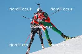 19.03.2011, Holmenkollen, Norway (NOR): Darya Domracheva (BLR), Fischer, Rottefella, Swix, Selina Gasparin (SUI), Rossignol, Rottefella, Leki, ODLO - IBU world cup biathlon, pursuit women, Holmenkollen (NOR). www.nordicfocus.com. © Manzoni/NordicFocus. Every downloaded picture is fee-liable.
