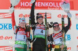 19.03.2011, Holmenkollen, Norway (NOR): (L-R): Darya Domracheva (BLR), Fischer, Rottefella, Swix, Anastasiya Kuzmina (SVK), Fischer, Salomon, Exel, Andrea Henkel (GER), Fischer, Rottefella, Exel, adidas, Toko - IBU world cup biathlon, pursuit women, Holmenkollen (NOR). www.nordicfocus.com. © Manzoni/NordicFocus. Every downloaded picture is fee-liable.