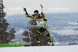 17.03.2011, Holmenkollen, Norway (NOR): Martin Fourcade (FRA), Rossignol, Rottefella, OneWay, Odlo - IBU world cup biathlon, sprint men, Holmenkollen (NOR). www.nordicfocus.com. © Manzoni/NordicFocus. Every downloaded picture is fee-liable.