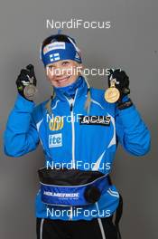 18.03.2011, Khanty-Mansiysk, Russia (RUS): Kaisa Maekaeraeinen (FIN), Fischer, Rottefella, Leki, Odlo - IBU world championships biathlon, medals, Khanty-Mansiysk (RUS). www.nordicfocus.com. © Manzoni/NordicFocus. Every downloaded picture is fee-liable.