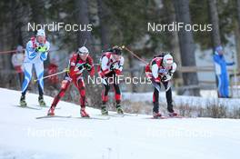 04.12.2011, Oestersund, Sweden (SWE): Dominik Landertinger (AUT), Atomic, Leki leads Sven Grossegger (AUT), Fischer, Rottefella, Leki, Michail Kletcherov (BUL), Fischer and Kauri Koiv (EST), Fischer, Rottefella, Leki - IBU world cup biathlon, pursuit men, Oestersund (SWE). www.nordicfocus.com. © Manzoni/NordicFocus. Every downloaded picture is fee-liable.