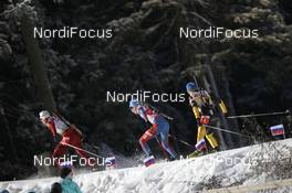 04.12.2011, Oestersund, Sweden (SWE): Tora Berger (NOR), Fischer, Rottefella, Odlo leads Kaisa Maekaeraeinen (FIN), Fischer, Rottefella, Leki, Odlo and Magdalena Neuner (GER), Fischer, Rottefella, Swix, adidas, Toko - IBU world cup biathlon, pursuit women, Oestersund (SWE). www.nordicfocus.com. © Manzoni/NordicFocus. Every downloaded picture is fee-liable.