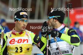 02.12.2011, Oestersund, Sweden (SWE): Martin Fourcade (FRA), Rossignol, Rottefella, OneWay, Odlo, Simon Fourcade (FRA), Fischer, Rottefella, Rossignol, Swix, Odlo - IBU world cup biathlon, sprint men, Oestersund (SWE). www.nordicfocus.com. © Manzoni/NordicFocus. Every downloaded picture is fee-liable.