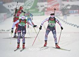 11.12.2011, Hochfilzen, Austria (AUT): l-r: Weronika Novakowska (POL), Fischer, Rottefella, Alpina, OneWay, Monika Hojnisz (POL), Fischer, Rottefella, Alpina, Leki, Casco  - IBU world cup biathlon, relay women, Hochfilzen (AUT). www.nordicfocus.com. © Felgenhauer/NordicFocus. Every downloaded picture is fee-liable.