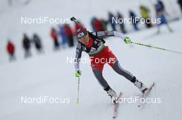 16.12.2011, Hochfilzen, Austria (AUT): Ji-Hee Mun (KOR), Fischer, Salomon, Leki  - IBU world cup biathlon, sprint women, Hochfilzen (AUT). www.nordicfocus.com. © Manzoni/NordicFocus. Every downloaded picture is fee-liable.