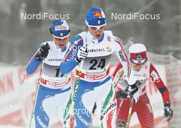 01.01.2011, Oberhof, Germany (GER): group, in front Marianna Longa (ITA), Fischer, Salomon, One Way, behind Arianna Follis (ITA), Fischer, Salomon, Swix  - FIS world cup cross-country, tour de ski, 10km women handicap start, Oberhof (GER). www.nordicfocus.com. © Hemmersbach/NordicFocus. Every downloaded picture is fee-liable.