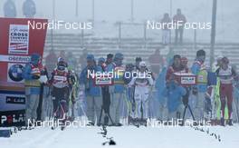 01.01.2011, Oberhof, Germany (GER): feature, start, l-r: Justyna Kowalczyk (POL), Fischer, Salomon, Swix, Charlotte Kalla (SWE), Fischer, Salomon, Swix, Craft, Astrid Uhrenholdt Jacobsen (NOR), Fischer, Rottefella, Swix  - FIS world cup cross-country, tour de ski, 10km women handicap start, Oberhof (GER). www.nordicfocus.com. © Hemmersbach/NordicFocus. Every downloaded picture is fee-liable.