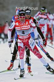 03.01.2011, Oberstdorf, Germany (GER): group, in front Alex Harvey (CAN), Fischer, Salomon, Swix, behind Dario Cologna (SUI), Fischer, Rottefella, Alpina, Swix, Odlo  - FIS world cup cross-country, tour de ski, pursuit men, Oberstdorf (GER). www.nordicfocus.com. © Hemmersbach/NordicFocus. Every downloaded picture is fee-liable.