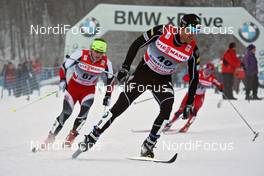 03.01.2011, Oberstdorf, Germany (GER): group, in front Andrew Newell (USA), Fischer, Salomon  - FIS world cup cross-country, tour de ski, pursuit men, Oberstdorf (GER). www.nordicfocus.com. © Hemmersbach/NordicFocus. Every downloaded picture is fee-liable.