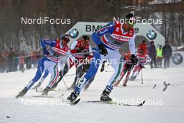 03.01.2011, Oberstdorf, Germany (GER): group, in front Valerio Checchi (ITA), Fischer, Salomon, Swix, Rudy Project  - FIS world cup cross-country, tour de ski, pursuit men, Oberstdorf (GER). www.nordicfocus.com. © Hemmersbach/NordicFocus. Every downloaded picture is fee-liable.