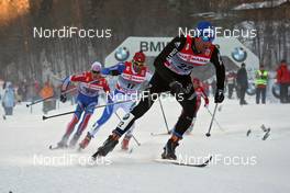 03.01.2011, Oberstdorf, Germany (GER): group, in front Curdin Perl (SUI), Rossignol, Rottefella, Swix, Odlo  - FIS world cup cross-country, tour de ski, pursuit men, Oberstdorf (GER). www.nordicfocus.com. © Hemmersbach/NordicFocus. Every downloaded picture is fee-liable.