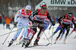 03.01.2011, Oberstdorf, Germany (GER): group, in front Jens Filbrich (GER), Rossignol, Rottefella, One Way, adidas, behind Marcus Hellner (SWE), Fischer, Salomon, Exel, Craft  - FIS world cup cross-country, tour de ski, pursuit men, Oberstdorf (GER). www.nordicfocus.com. © Hemmersbach/NordicFocus. Every downloaded picture is fee-liable.