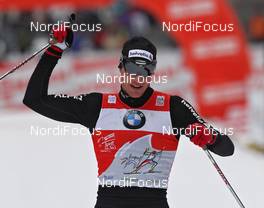06.01.2011, Cortina-Toblach, Italy (ITA): todays winner Dario Cologna (SUI), Fischer, Rottefella, Alpina, Swix, Odlo  - FIS world cup cross-country, tour de ski, 35km men handicap start, Cortina-Toblach (ITA). www.nordicfocus.com. © Hemmersbach/NordicFocus. Every downloaded picture is fee-liable.