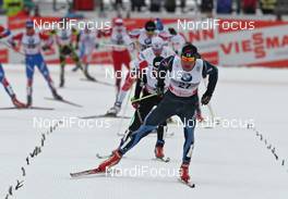 06.01.2011, Cortina-Toblach, Italy (ITA): group, in front Ville Nousiainen (FIN), Peltonen, Rottefella, Alpina  - FIS world cup cross-country, tour de ski, 35km men handicap start, Cortina-Toblach (ITA). www.nordicfocus.com. © Hemmersbach/NordicFocus. Every downloaded picture is fee-liable.