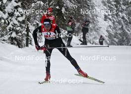 06.01.2011, Cortina-Toblach, Italy (ITA): Dario Cologna (SUI), Fischer, Rottefella, Alpina, Swix, Odlo  - FIS world cup cross-country, tour de ski, 35km men handicap start, Cortina-Toblach (ITA). www.nordicfocus.com. © Hemmersbach/NordicFocus. Every downloaded picture is fee-liable.