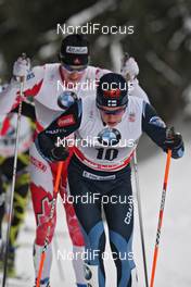 06.01.2011, Cortina-Toblach, Italy (ITA): group, in front Matti Heikkinen (FIN), Fischer, Rottefella, Alpina, Exel, behind Alex Harvey (CAN), Fischer, Salomon, Swix  - FIS world cup cross-country, tour de ski, 35km men handicap start, Cortina-Toblach (ITA). www.nordicfocus.com. © Hemmersbach/NordicFocus. Every downloaded picture is fee-liable.