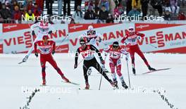 05.01.2011, Toblach, Italy (ITA): group, l-r: Petter Northug (NOR), Fischer, Rottefella, Alpina, Ski Go, Swix , Dario Cologna (SUI), Fischer, Rottefella, Alpina, Swix, Odlo, Devon Kershaw (CAN), Fischer, Salomon, Swix  - FIS world cup cross-country, tour de ski, individual sprint, Toblach (ITA). www.nordicfocus.com. © Hemmersbach/NordicFocus. Every downloaded picture is fee-liable.