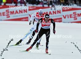 05.01.2011, Toblach, Italy (ITA): group, in front Dario Cologna (SUI), Fischer, Rottefella, Alpina, Swix, Odlo, behind Daniel Rickardsson (SWE), Fischer, Salomon, Swix  - FIS world cup cross-country, tour de ski, individual sprint, Toblach (ITA). www.nordicfocus.com. © Hemmersbach/NordicFocus. Every downloaded picture is fee-liable.