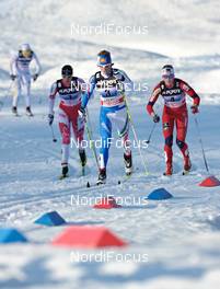 16.01.2011, Liberec, Czech Republic (CZE): l-r: Chandra Crawford (CAN), Fischer, Rottefella, Swix, Marianna Longa (ITA), Fischer, Salomon, One Way, Celine Brun-Lie (NOR), Fischer, Rottefella, Alpina, Swix  - FIS world cup cross-country, team sprint, Liberec (CZE). www.nordicfocus.com. © Felgenhauer/NordicFocus. Every downloaded picture is fee-liable.