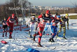 16.01.2011, Liberec, Czech Republic (CZE): l-r: Johan Kjoelstad (NOR), Rossignol, Rottefella, Swix, Andrey Parfenov (RUS), Fischer, Rottefella, Alpina, Swix, Cyril Gaillard (FRA), One Way, lead the race - FIS world cup cross-country, team sprint, Liberec (CZE). www.nordicfocus.com. © Felgenhauer/NordicFocus. Every downloaded picture is fee-liable.