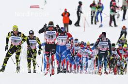 04.02.2011, Rybinsk, Russia (RUS): group, in front, l-r: Jean Marc Gaillard (FRA), Fischer, Rottefella, Swix, One Way, Franz Goering (GER), Atomic, adidas, Toko, Alpina, Rottefella, Swix - FIS world cup cross-country, pursuit men, Rybinsk (RUS). www.nordicfocus.com. © Hemmersbach/NordicFocus. Every downloaded picture is fee-liable.