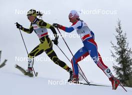 04.02.2011, Rybinsk, Russia (RUS): l-r: Laure Barthelemy (FRA), Fischer, Salomon, Swix, One Way, Valentina Novikova (RUS), Fischer, Rottefella, Alpina, Adidas, Swix  - FIS world cup cross-country, pursuit women, Rybinsk (RUS). www.nordicfocus.com. © Hemmersbach/NordicFocus. Every downloaded picture is fee-liable.