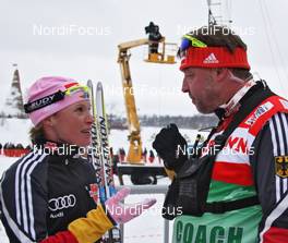 04.02.2011, Rybinsk, Russia (RUS): l-r: Evi Sachenbacher Stehle (GER), Salomon, One Way, adidas, Jochen Behle (GER), headcoach cross-country  - FIS world cup cross-country, pursuit women, Rybinsk (RUS). www.nordicfocus.com. © Hemmersbach/NordicFocus. Every downloaded picture is fee-liable.