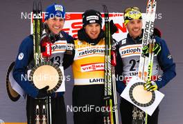 12.03.2011, Lahti, Finland (FIN):  (l-r) Maurice Manificat (FRA), Fischer, Swix, Rottefella, One Way, Dario Cologna (SUI), Fischer, Swix, Alpina, Rottefella, ODLO, Casco, Toko and Vincent Vittoz (FRA), Rossignol, One Way, Rottefella - FIS world cup cross-country, pursuit men, Lahti (FIN). www.nordicfocus.com. © Laiho/NordicFocus. Every downloaded picture is fee-liable.