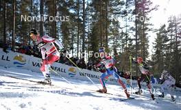 20.03.2011, Falun, Sweden (SWE): l-r: Ivan Babikov (CAN), Salomon, One Way, Maxim Vylegzhanin (RUS), Fischer, Rottefella, Alpina, Swix, adidas, Tobias Angerer (GER), Rossignol, Rottefella, One Way, adidas  - FIS world cup cross-country, 15km men handicap start, Falun (SWE). www.nordicfocus.com. © Felgenhauer/NordicFocus. Every downloaded picture is fee-liable.