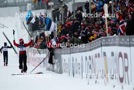 01.03.2011, Oslo, Norway (NOR): the three best skiers celebrate in front of the spectators  - FIS nordic world ski championships, cross-country, 15km men, Oslo (NOR). www.nordicfocus.com. © Laiho/NordicFocus. Every downloaded picture is fee-liable.