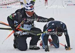 01.03.2011, Oslo, Norway (NOR): l-r: Magnar Dalen (NOR) Headcoach Team Finland and Matti Heikkinen (FIN), Fischer, Rottefella, Alpina, Exel  - FIS nordic world ski championships, cross-country, 15km men, Oslo (NOR). www.nordicfocus.com. © Hemmersbach/NordicFocus. Every downloaded picture is fee-liable.