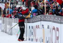 01.03.2011, Oslo, Norway (NOR): Martin Jonsrud Sundby (NOR), Fischer, KV+, Alpina, Rottefella, Swix congratulated by Andreas Fuchs (AUT), Fischer race service  - FIS nordic world ski championships, cross-country, 15km men, Oslo (NOR). www.nordicfocus.com. © Laiho/NordicFocus. Every downloaded picture is fee-liable.