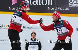 01.03.2011, Oslo, Norway (NOR): (r-l) Martin Jonsrud Sundby (NOR), Fischer, KV+, Alpina, Rottefella, Swix congratulates Eldar Roenning (NOR), Rossignol, Swix, Rottefella, the winner Matti Heikkinen (FIN), Fischer, Exel, Alpina, Rottefella, Craft waits still behind  - FIS nordic world ski championships, cross-country, 15km men, Oslo (NOR). www.nordicfocus.com. © Laiho/NordicFocus. Every downloaded picture is fee-liable.