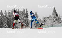 01.03.2011, Oslo, Norway (NOR): (l-r) Javier Gutierrez (SPA) and Alexey Poltoranin (KAZ), Fischer, Swix, Salomon - FIS nordic world ski championships, cross-country, 15km men, Oslo (NOR). www.nordicfocus.com. © Laiho/NordicFocus. Every downloaded picture is fee-liable.