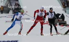 24.02.2011, Oslo, Norway (NOR): (l-r) Federico Pellegrino (ITA), Skitrab, Alpina, One Way, Rottefella, Petter Northug (NOR), Fischer, Swix, Alpina, Rottefella, Skigo and Dario Cologna (SUI), Fischer, Swix, Alpina, Rottefella, ODLO, Casco, Toko  - FIS nordic world ski championships, cross-country, individual sprint, Oslo (NOR). www.nordicfocus.com. © Laiho/NordicFocus. Every downloaded picture is fee-liable.