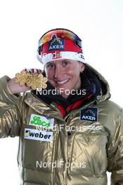 28.02.2011, Oslo, Norway (NOR): Gold Medalist Marit Bjoergen (NOR), Fischer, Rottefella, Swix  - FIS nordic world ski championships, cross-country, medals, Oslo (NOR). www.nordicfocus.com. © Hemmersbach/NordicFocus. Every downloaded picture is fee-liable.