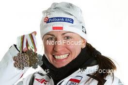 05.03.2011, Oslo, Norway (NOR): Justyna Kowalczyk (POL), Fischer, Salomon, Swix  - FIS nordic world ski championships, cross-country, medals, Oslo (NOR). www.nordicfocus.com. © Hemmersbach/NordicFocus. Every downloaded picture is fee-liable.