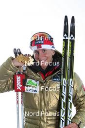 28.02.2011, Oslo, Norway (NOR): Gold Medalist Marit Bjoergen (NOR), Fischer, Rottefella, Swix  - FIS nordic world ski championships, cross-country, medals, Oslo (NOR). www.nordicfocus.com. © Hemmersbach/NordicFocus. Every downloaded picture is fee-liable.