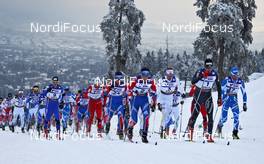27.02.2011, Oslo, Norway (NOR): in front l-r: Petter Northug (NOR), Fischer, Rottefella, Alpina, Ski Go, Swix, Ilia Chernousov (RUS), Fischer, Rottefella, Swix, adidas, Alexander Legkov (RUS), Madshus, Rottefella, Swix, adidas, Daniel Rickardsson (SWE), Fischer, Salomon, Swix, Dario Cologna (SUI), Fischer, Rottefella, Alpina, Swix, Odlo, Jean Marc Gaillard (FRA), Fischer, Rottefella, Swix, One Way with the town of Oslo in the background - FIS nordic world ski championships, cross-country, pursuit men, Oslo (NOR). www.nordicfocus.com. © Hemmersbach/NordicFocus. Every downloaded picture is fee-liable.