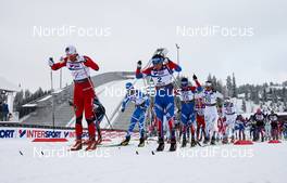 27.02.2011, Oslo, Norway (NOR):  (l-r) Petter Northug (NOR), Fischer, Swix, Alpina, Rottefella, Skigo leading a big group of skiers wirth Alexander Legkov (RUS), Madshus, Swix, Rottefella, Adidas - FIS nordic world ski championships, cross-country, pursuit men, Oslo (NOR). www.nordicfocus.com. © Laiho/NordicFocus. Every downloaded picture is fee-liable.